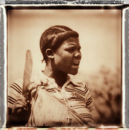 WOMAN WITH MACHETE, UGANDA